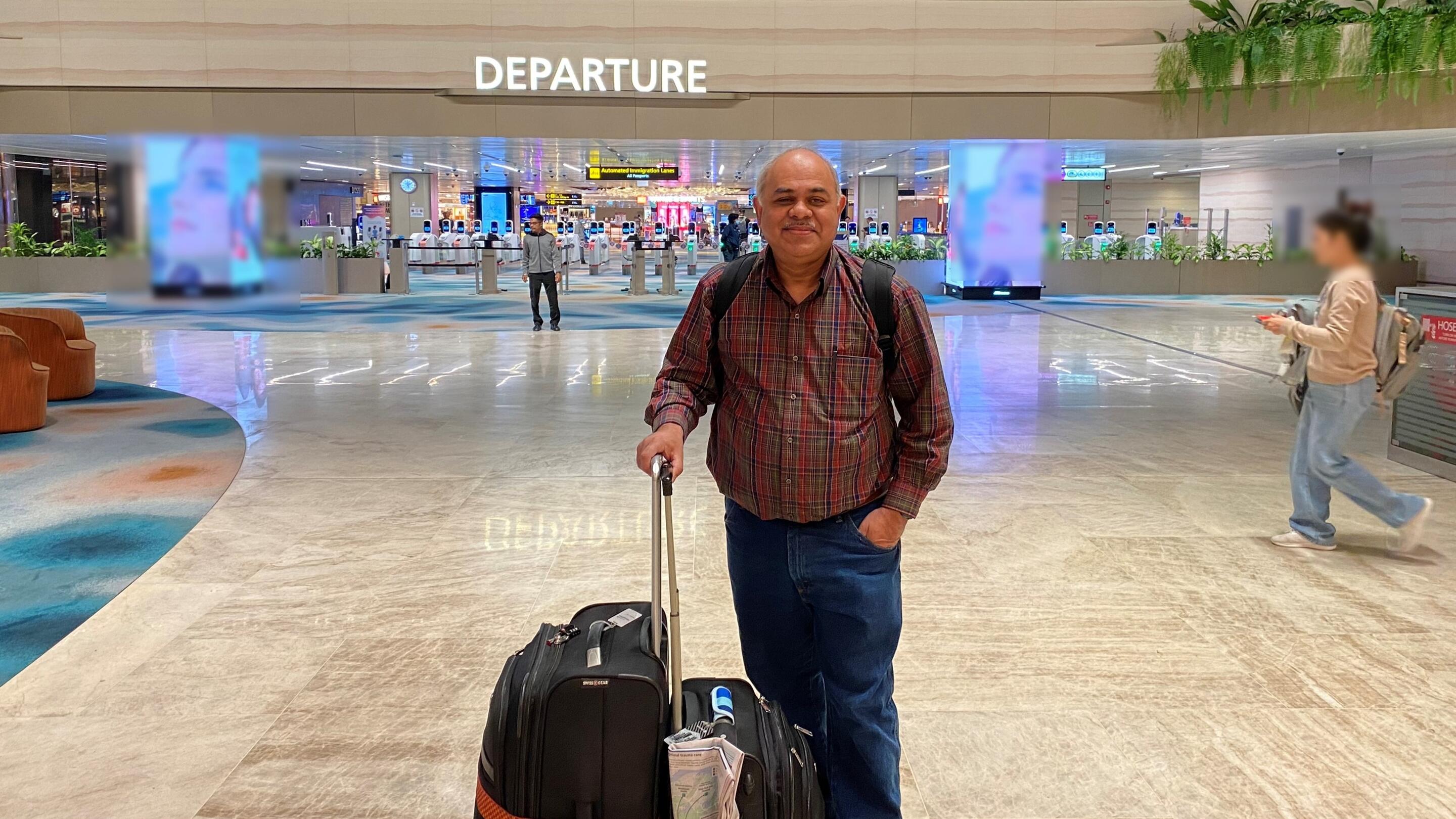 Tahmid at Changi Airport for departure