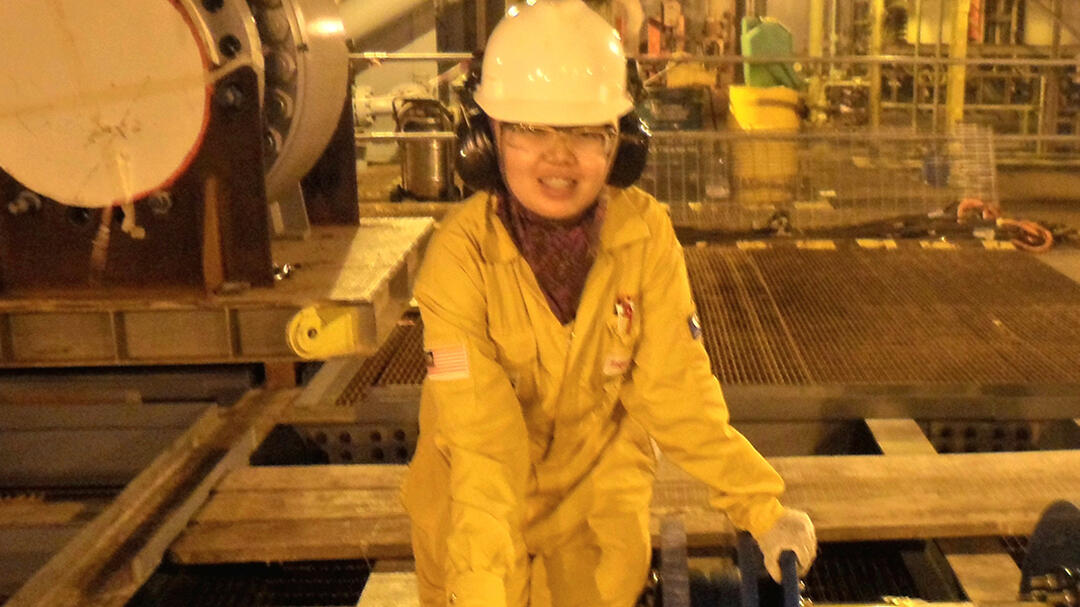 An employee wearing safety gear at gas pipeline blowdown activity offshore with 2 bi-directional pigs.