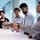 ExxonMobil Malaysia KLTC engineers in meeting evaluating a 3D model