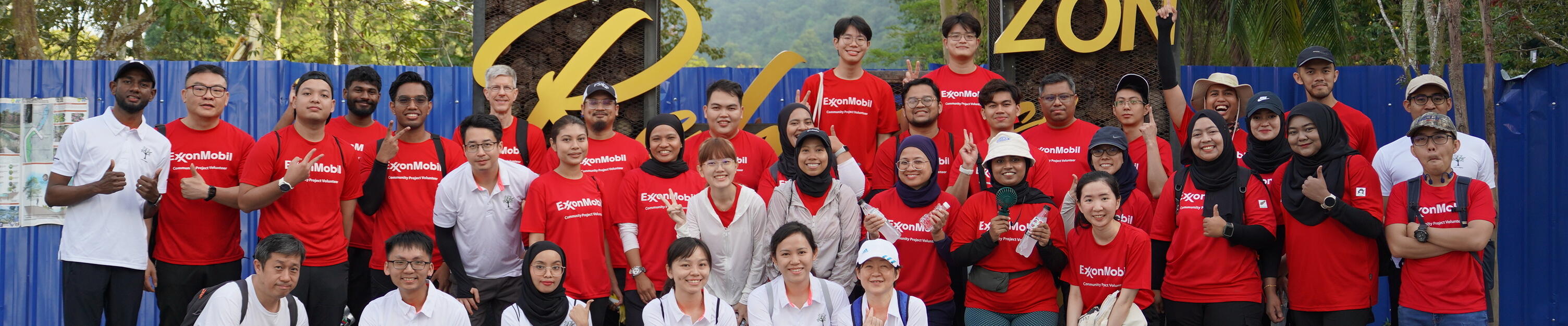 ExxonMobil Malaysia employees volunteering in local environmental initiatives.