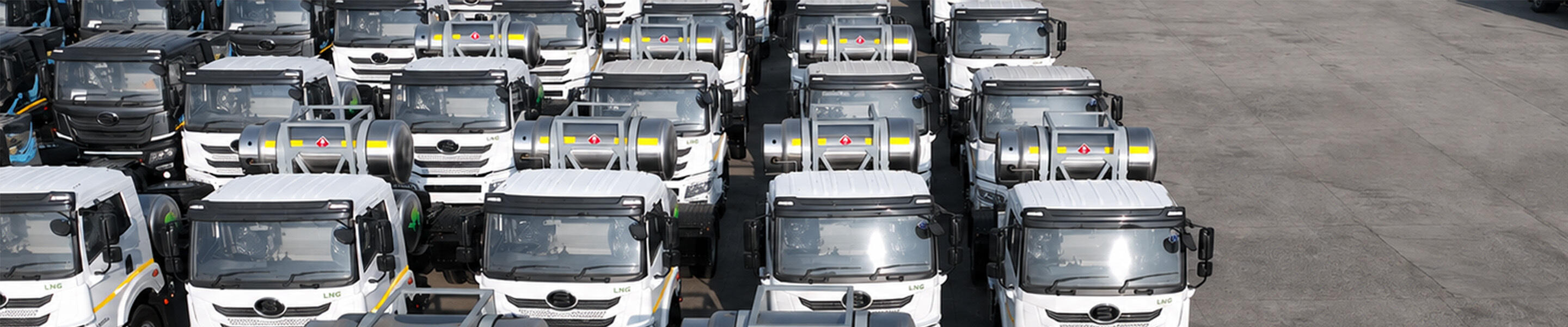 rows of LNG-powered heavy-duty trucks