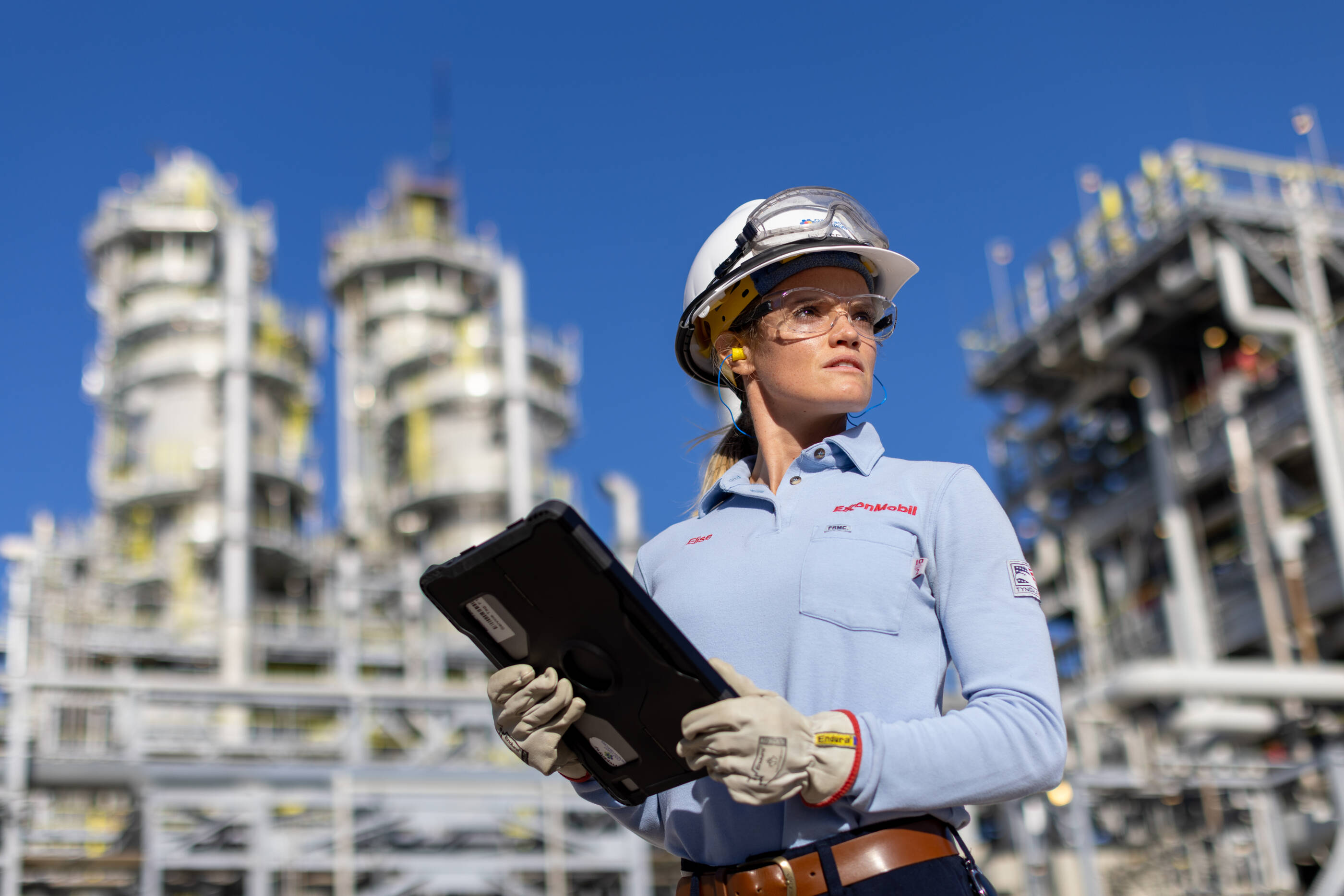 Woman ExxonMobil employee at a job site.