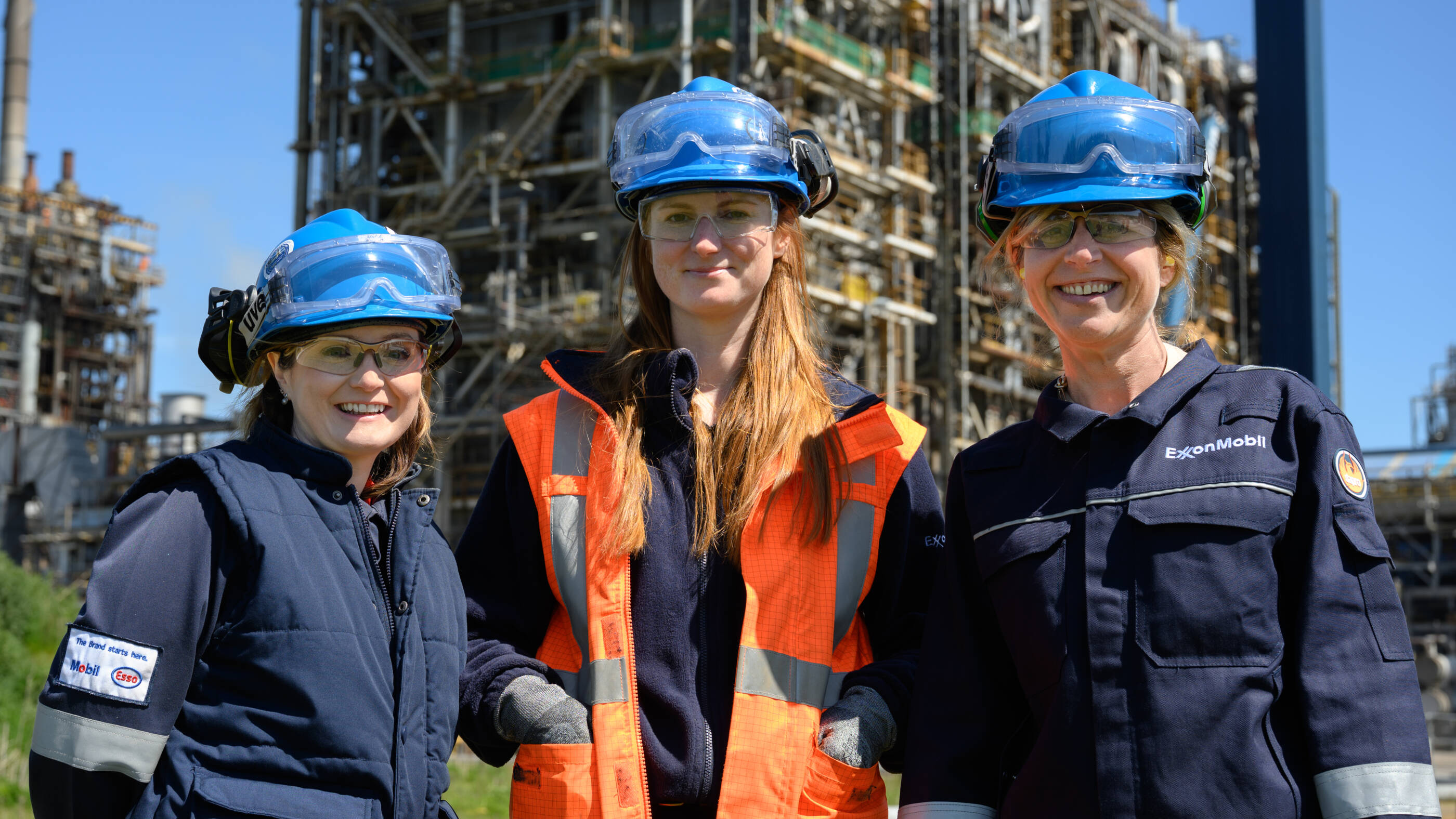 three female chemical engineers in front of Fife plant