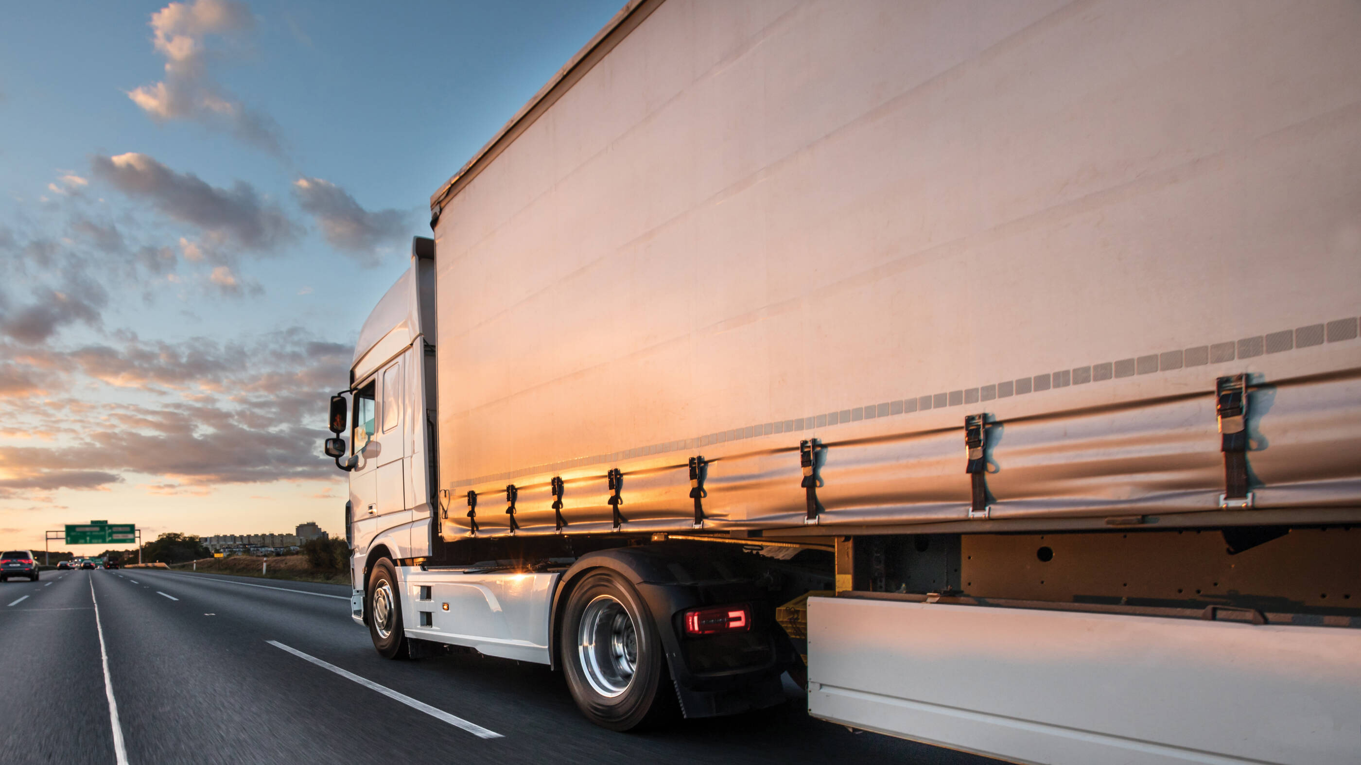 Semi truck driving on the road