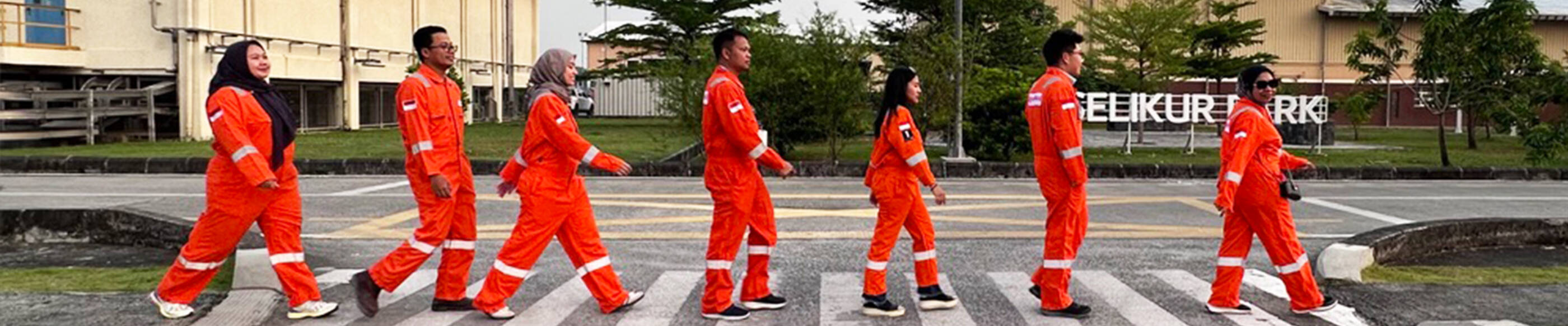 Employees walking across the street