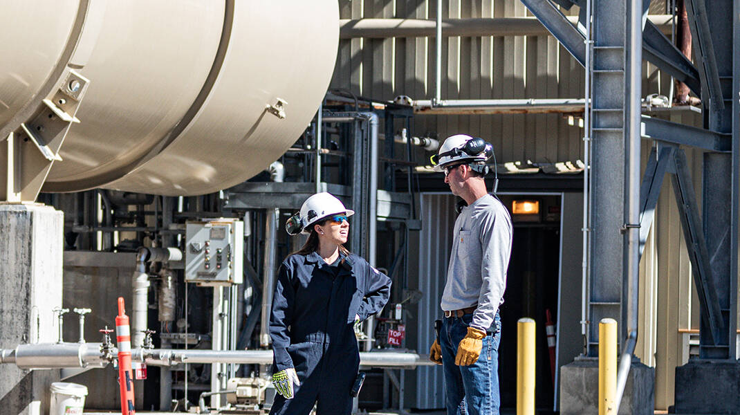 ExxonMobil employees working outside