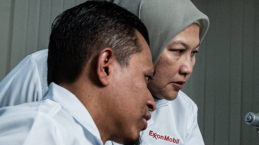 ExxonMobil employees working in technology