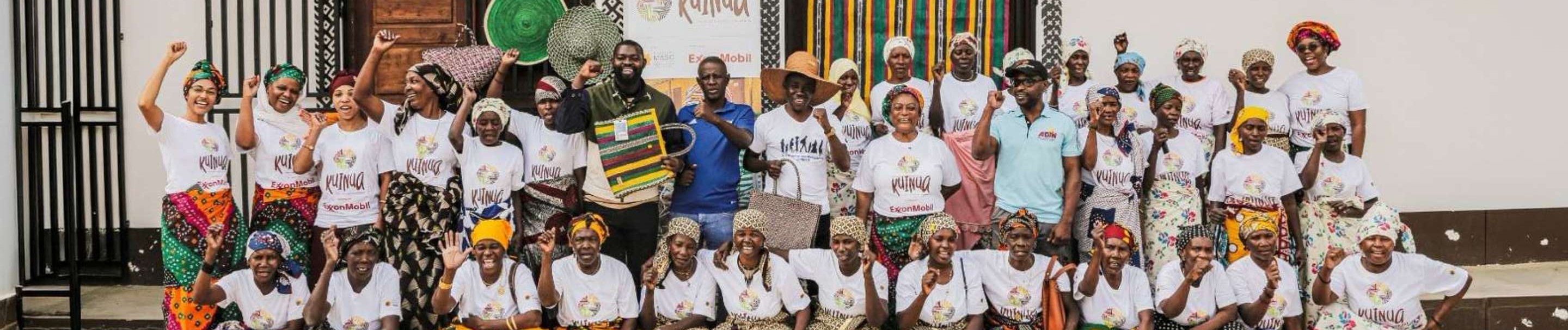 group of Mozambicans posed outside building